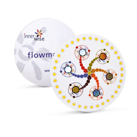 A white and yellow plate with a colorful design on it.